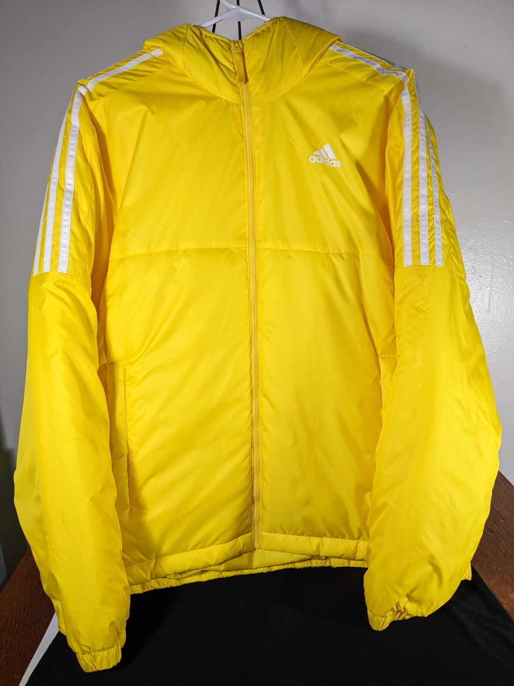 adidas Yellow Hooded Puffer with White Three-Stripes. Size Medium.